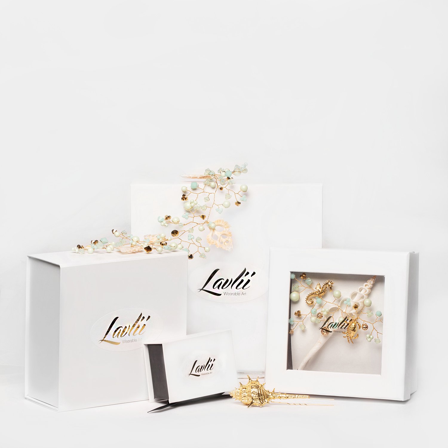 Elegant jewelry pieces from Lavii displayed with their exquisite packaging.